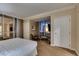 Bright bedroom features cozy seating area with large windows and carpeted floor at 135 E Harmon Ave # 2821, Las Vegas, NV 89109