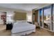 Comfortable bedroom with cozy chair and soft lighting is ideal for relaxation at 135 E Harmon Ave # 2821, Las Vegas, NV 89109