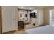 Bedroom with TV, large windows, soft lighting, and comfortable seating area at 135 E Harmon Ave # 2821, Las Vegas, NV 89109