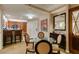 Comfortable dining area features a glass table, four chairs, and modern décor at 135 E Harmon Ave # 2821, Las Vegas, NV 89109