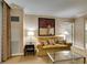 Living room featuring a sofa, coffee table, wall art, and access to a bathroom and kitchen at 135 E Harmon Ave # 2821, Las Vegas, NV 89109