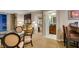 Inviting living area with a glass table, comfortable seating, and access to the bathroom at 135 E Harmon Ave # 2821, Las Vegas, NV 89109