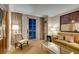 Inviting living area with comfortable seating and balcony access to the city at 135 E Harmon Ave # 2821, Las Vegas, NV 89109