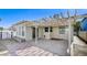 Backyard featuring a covered patio, concrete slab, and pathway to the rear of the home at 1950 Turtlerock St, Las Vegas, NV 89142