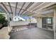 Charming covered patio leading to sliding glass doors, ideal for indoor-outdoor living at 1950 Turtlerock St, Las Vegas, NV 89142