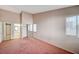 Spacious bedroom featuring carpet flooring, an abundance of natural light, and closet at 1950 Turtlerock St, Las Vegas, NV 89142