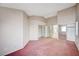 Large bedroom featuring carpet flooring, closet, access to ensuite bathroom, and natural light at 1950 Turtlerock St, Las Vegas, NV 89142