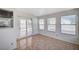Bright breakfast nook with tile flooring, and large windows with views of the backyard, leading to outdoor patio at 1950 Turtlerock St, Las Vegas, NV 89142