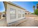 Backyard home exterior with covered patio and walkway at 1950 Turtlerock St, Las Vegas, NV 89142