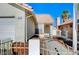 Lovely single-story home featuring a charming front entrance, complemented by a tile roof and mature desert landscaping at 1950 Turtlerock St, Las Vegas, NV 89142