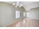 Bright and open living room featuring neutral paint, vaulted ceilings, tile floors, and lots of natural light at 1950 Turtlerock St, Las Vegas, NV 89142