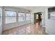 Bright living room with tile flooring and windows, providing ample natural light throughout the space at 1950 Turtlerock St, Las Vegas, NV 89142