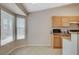 Eat-in kitchen with tile floor, granite counters and lots of natural light at 1981 Spring Lake Dr, Henderson, NV 89002
