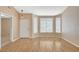 Bright living room features wood floors, neutral paint, and large windows for natural light at 1981 Spring Lake Dr, Henderson, NV 89002