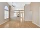 Bright living room boasts hardwood floors, neutral walls, and an open layout, perfect for entertaining at 1981 Spring Lake Dr, Henderson, NV 89002