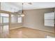 Spacious living area with wood floors, lots of light, and an open floor plan, great for entertaining at 1981 Spring Lake Dr, Henderson, NV 89002