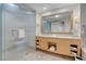 Elegant bathroom featuring double vanity, and large walk-in shower with glass door at 2000 Fashion Show Dr # 2400, Las Vegas, NV 89109