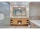 Elegant bathroom featuring double vanity, soaking tub, and large walk-in shower at 2000 Fashion Show Dr # 2400, Las Vegas, NV 89109