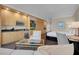 Spacious studio featuring a kitchenette, bed, and sitting area with comfortable furniture at 2000 Fashion Show Dr # 2400, Las Vegas, NV 89109