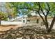 Spacious backyard with a covered patio, perfect for outdoor entertaining and relaxation at 2105 Madagascar Ln, Las Vegas, NV 89117