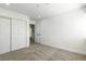 Bedroom featuring carpet, white walls, closet and an open door in a modern home at 2105 Madagascar Ln, Las Vegas, NV 89117