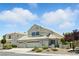 Lovely two-story home with a three-car garage and mature trees in the yard at 2105 Madagascar Ln, Las Vegas, NV 89117