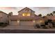 Charming two-story home with a three-car garage and well-maintained landscaping at 2105 Madagascar Ln, Las Vegas, NV 89117