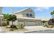 Beautiful two-story home with a three-car garage and tile roof at 2105 Madagascar Ln, Las Vegas, NV 89117