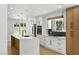 Bright kitchen with new cabinets, stainless steel appliances, and white countertops at 2105 Madagascar Ln, Las Vegas, NV 89117
