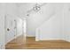 Bright living room with hardwood floors and a modern chandelier at 2105 Madagascar Ln, Las Vegas, NV 89117