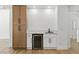 Cozy wet bar with a wine fridge, storage cabinets, and modern sink at 2105 Madagascar Ln, Las Vegas, NV 89117