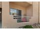 Private balcony offers a cozy outdoor space with a lovely chair and railing at 2243 Aspen Mirror Way # 102, Laughlin, NV 89029