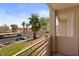 Balcony view of the complex, parking area, and surrounding desert landscape at 2243 Aspen Mirror Way # 102, Laughlin, NV 89029