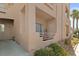 Exterior view showing private balconies, desert landscaping, and proximity to parking at 2243 Aspen Mirror Way # 102, Laughlin, NV 89029