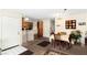 Inviting living room area and dining area with neutral colors and a front door entrance at 2243 Aspen Mirror Way # 102, Laughlin, NV 89029