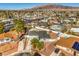 Charming single-story home features a pool and is nestled within a vibrant neighborhood at 2450 Tournament St, Las Vegas, NV 89142