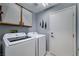 Laundry room featuring a modern side by side washer and dryer at 2456 Desert Butte Dr, Las Vegas, NV 89134
