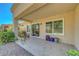Back patio with seating area and desert landscaping, perfect for outdoor enjoyment at 2456 Desert Butte Dr, Las Vegas, NV 89134