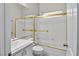 Bright bathroom with a shower-tub combination and modern white fixtures at 2512 Huber Heights Dr, Las Vegas, NV 89128