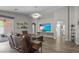 Bright living room with hardwood floors, comfortable seating, and a large built-in TV area creates an inviting atmosphere at 2512 Huber Heights Dr, Las Vegas, NV 89128