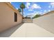 Pavered side yard with block wall for added privacy at 2512 Huber Heights Dr, Las Vegas, NV 89128