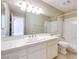 Bathroom vanity featuring white countertops, and a tub and shower combo at 2723 Seabridge Dr, Las Vegas, NV 89121