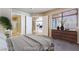 Inviting bedroom with a dresser, window, and an ensuite bathroom nearby at 2723 Seabridge Dr, Las Vegas, NV 89121