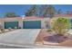 Charming home featuring a well-maintained yard, a two-car garage, and a tiled roof at 2723 Seabridge Dr, Las Vegas, NV 89121