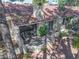 Townhouse with red tile roof, neutral stucco, and private outdoor patio space at 2723 Seabridge Dr, Las Vegas, NV 89121