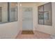 Inviting tiled entry featuring a secure front door and sidelight windows at 2723 Seabridge Dr, Las Vegas, NV 89121
