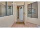 View of an open door featuring a decorative glass insert and sidelight windows at 2723 Seabridge Dr, Las Vegas, NV 89121