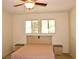 Bright bedroom featuring a ceiling fan, carpet, and large windows at 2831 Geary Pl # 2918, Las Vegas, NV 89109