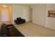 Bright and inviting living room with plush carpeting and neutral walls at 2831 Geary Pl # 2918, Las Vegas, NV 89109