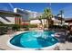 Inviting community pool with lounge chairs and tables provides a relaxing outdoor retreat for residents at 2831 Geary Pl # 2918, Las Vegas, NV 89109